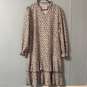 Modern style cream and black dress